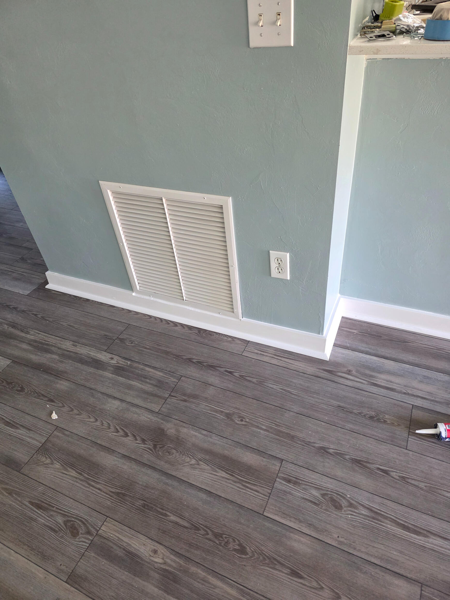 Devin Shaw of Shaw Flooring LLC is a plank/baseboard/quarter-round professional. Everything seen was installed custom by Devin S